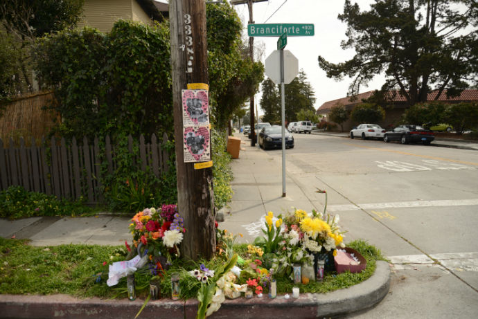A memorial exists at the corner of N. Branciforte Avenue and Doyle Street in memory of Loran "Butch" Baker and Elizabeth Butler, two Santa Cruz police officers who were shot during an investigation of a sexual assault complaint on Feb. 26. Photo by Jessica Tran.