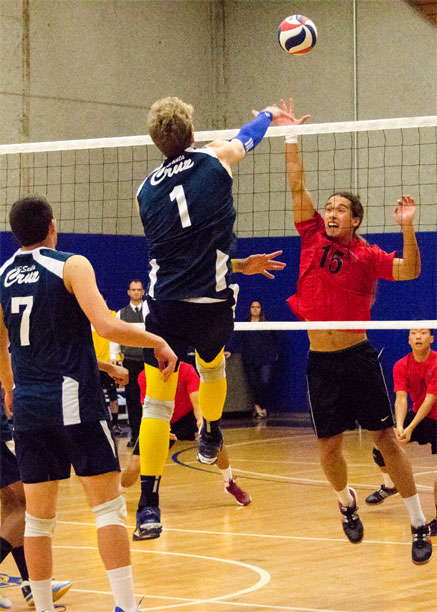 Forst spikes the ball past the defending blocker for one of his six kills of the game. Photo by Jessie Case.