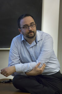 Noah Salomon, assistant professor of religion at Carleton College, delivered a speech on Tuesday night regarding violence in South Sudan.  Photo by Casey Amaral.
