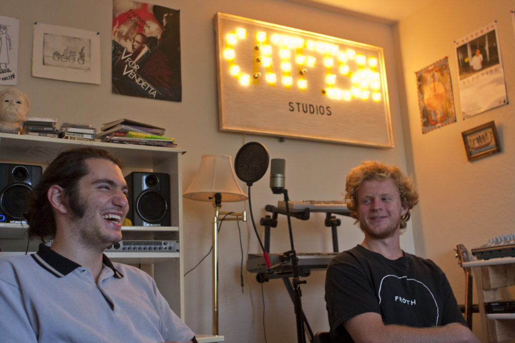 UC Santa Cruz students Tony Assi (left) and Lennon Stankavich (right) discuss the Santa Cruz Musical Festival in Assi’s home studio. Their band, Tony Tricks, performed downtown at Streetlight Records on Saturday. Photo by Ali Enright