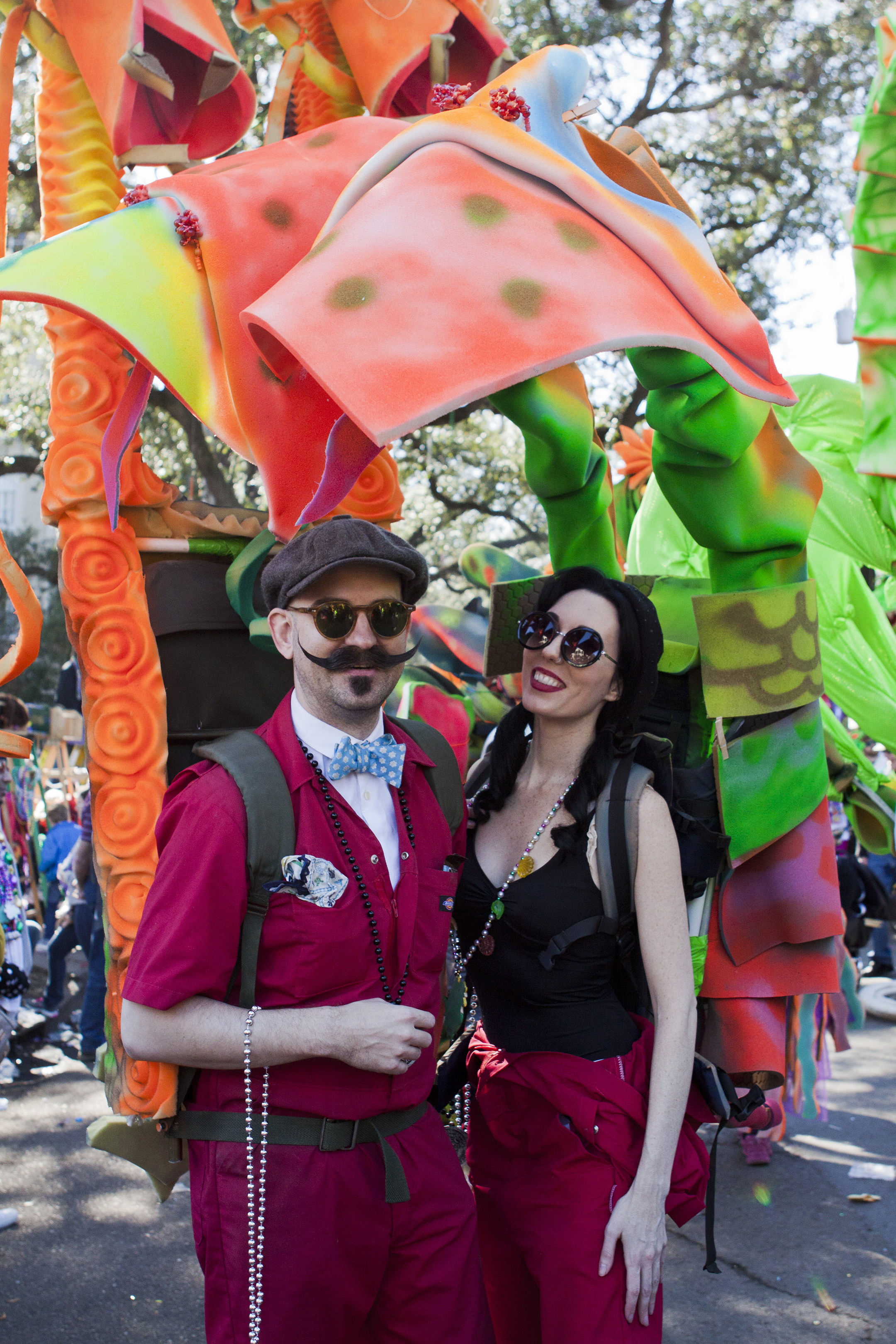 Two members of the “Dragons of New Orleans” walking krewe displayed their homemade costumes during their participation in the Tucks Parade. 