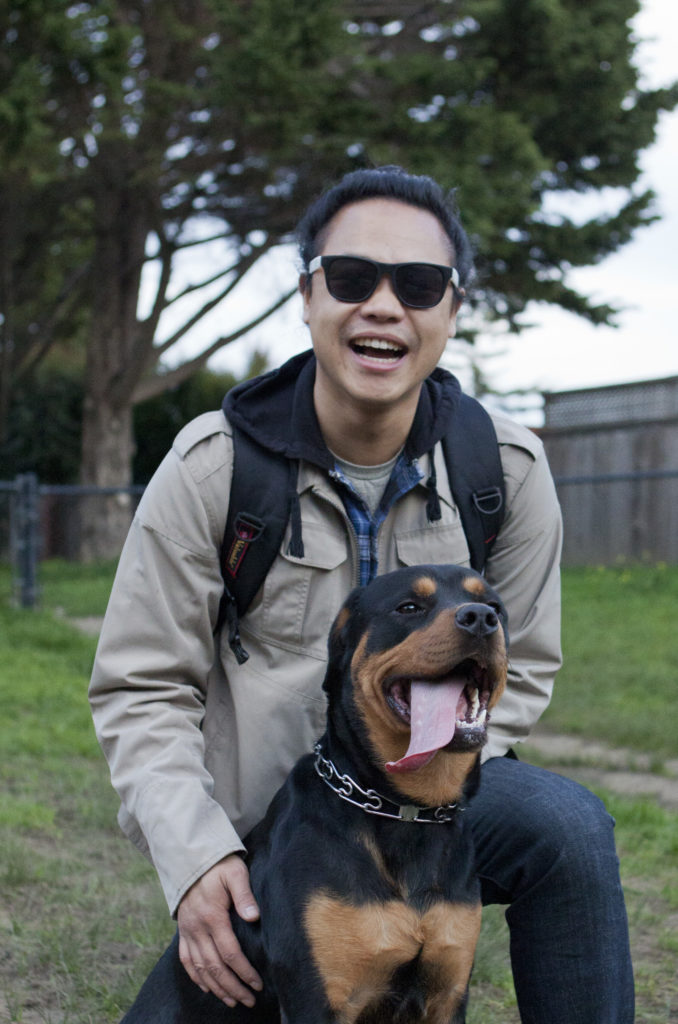 Thomas Pham, who has had Diesel for over a year, lives on campus in Porter College with his emotional support dog and takes him to the University Terrace Park most afternoons. Photo by Ali Enright.
